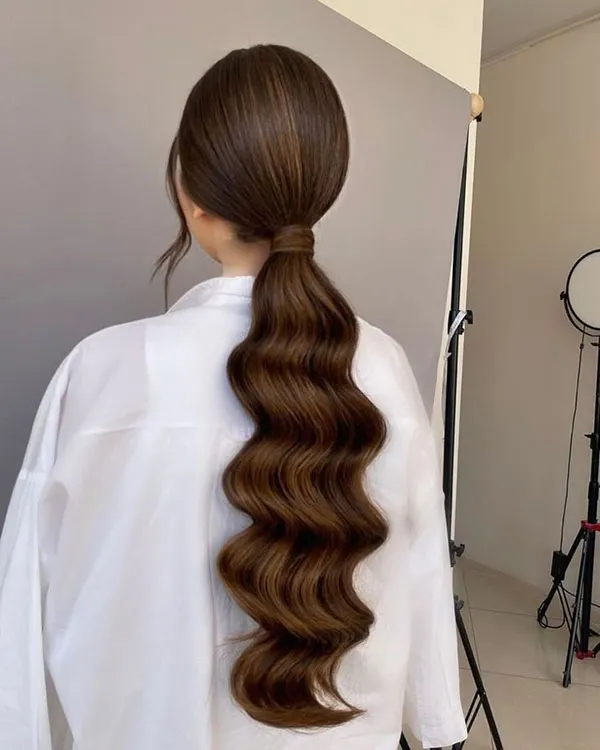 Girls curly ponytail hairstyle 15