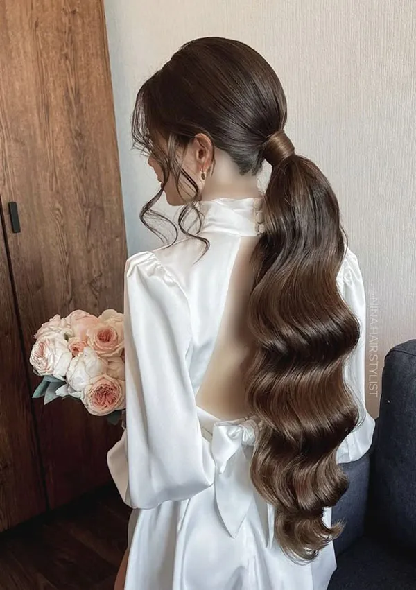 Girls curly ponytail hairstyle 16