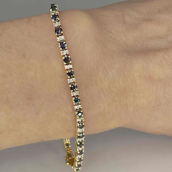 Gold tennis bracelet 13