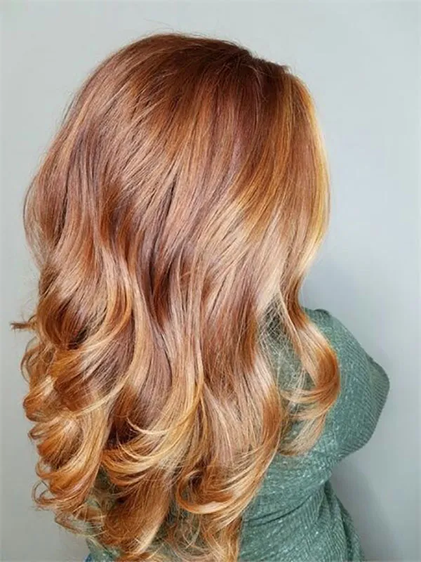 مدل رنگ مو کهربایی دخترانه؛ ترند گرم و درخشان 2025 4 Amber hair color 1