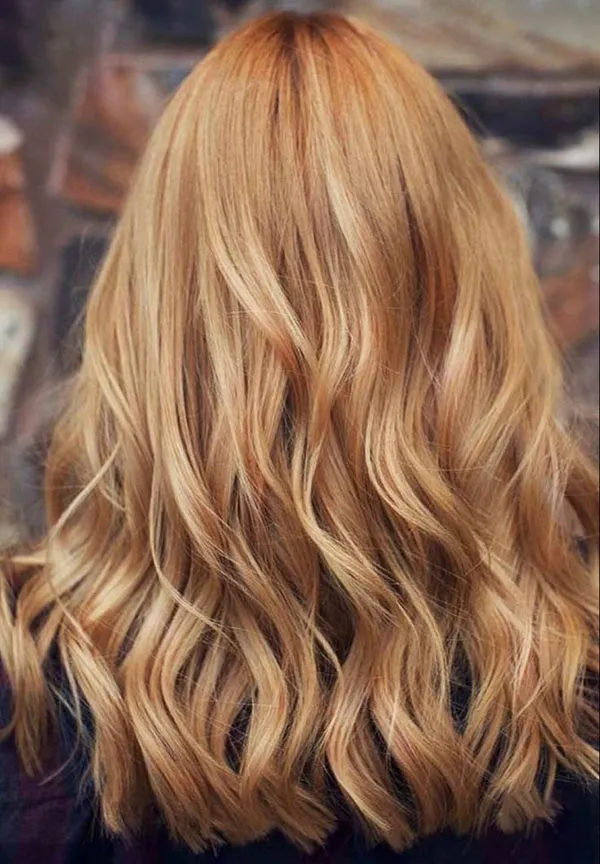 مدل رنگ مو کهربایی دخترانه؛ ترند گرم و درخشان 2025 16 Amber hair color 14