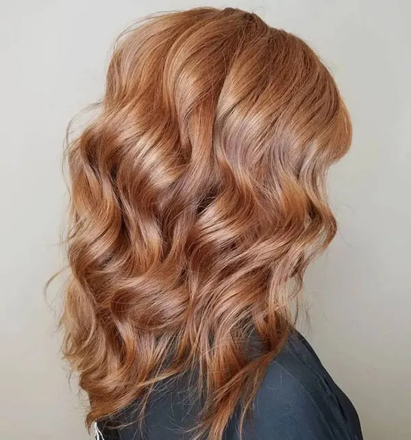 مدل رنگ مو کهربایی دخترانه؛ ترند گرم و درخشان 2025 5 Amber hair color 2