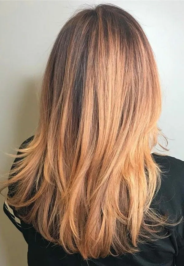 مدل رنگ مو کهربایی دخترانه؛ ترند گرم و درخشان 2025 6 Amber hair color 3