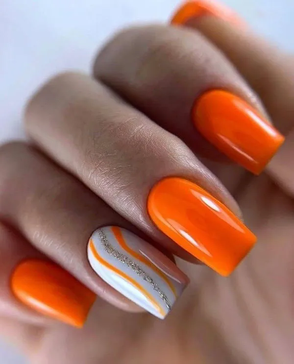 Orange and white nail design 1