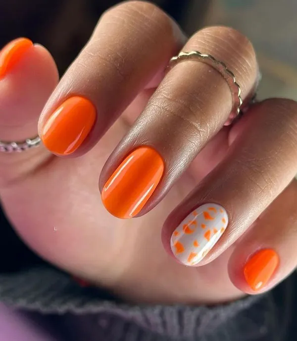 Orange and white nail design 11