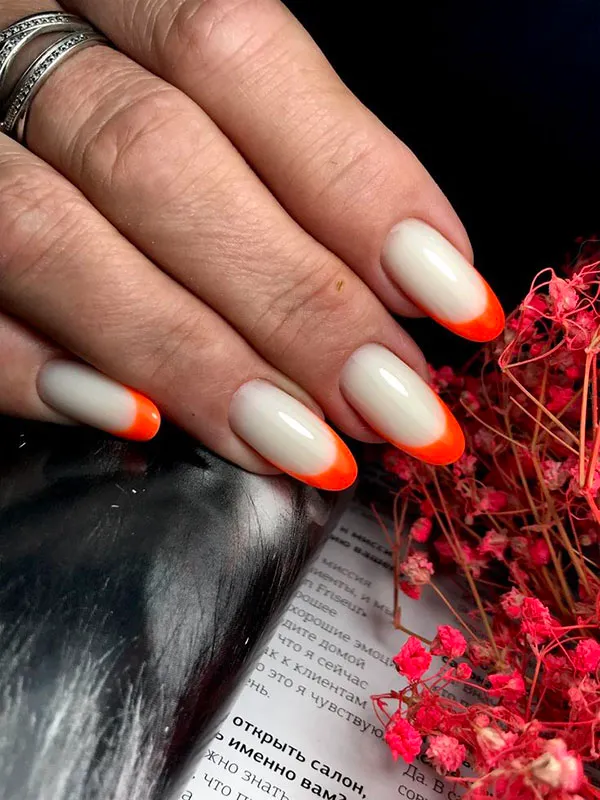 Orange and white nail design 12