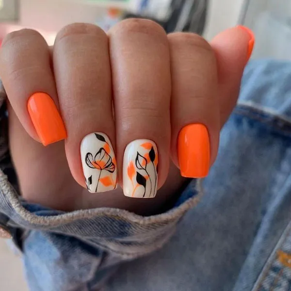 Orange and white nail design 13