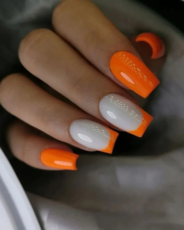 Orange and white nail design 14