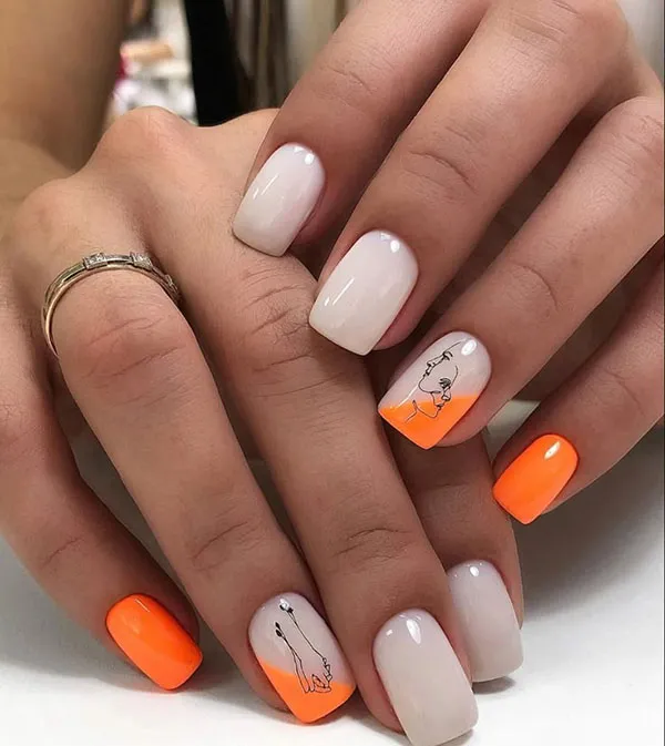 Orange and white nail design 15