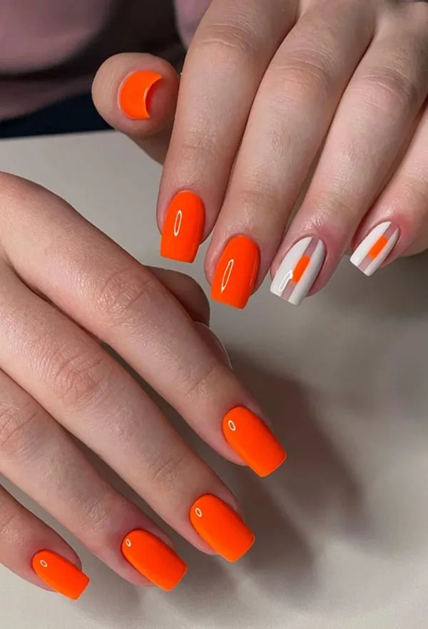Orange and white nail design 16