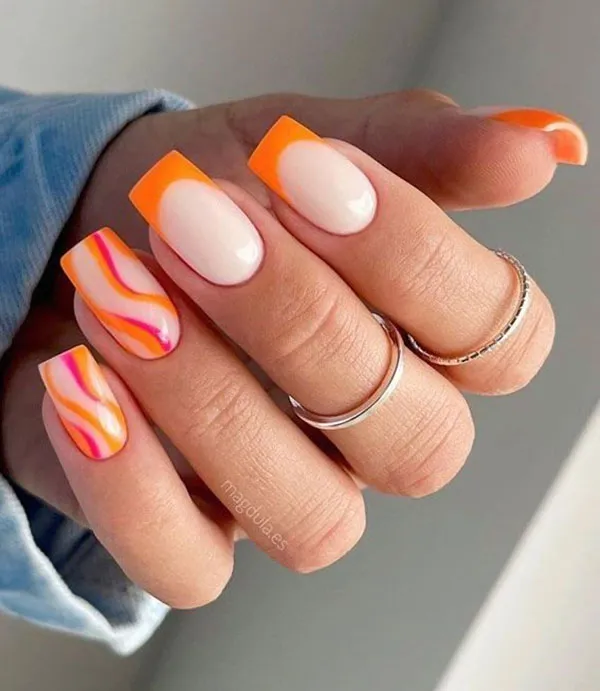 Orange and white nail design 19