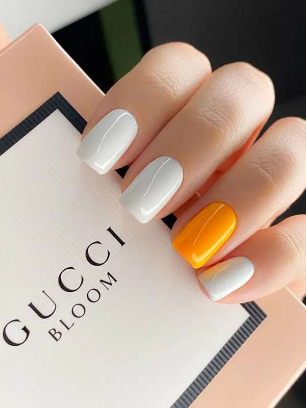 Orange and white nail design 21