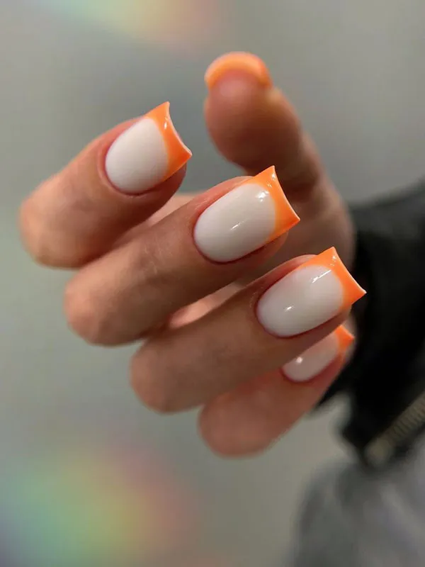 Orange and white nail design 23