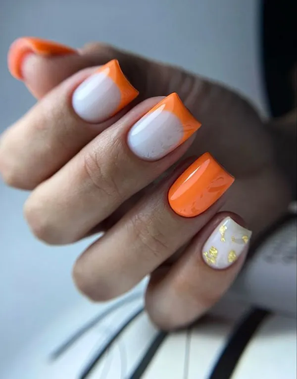 Orange and white nail design 24
