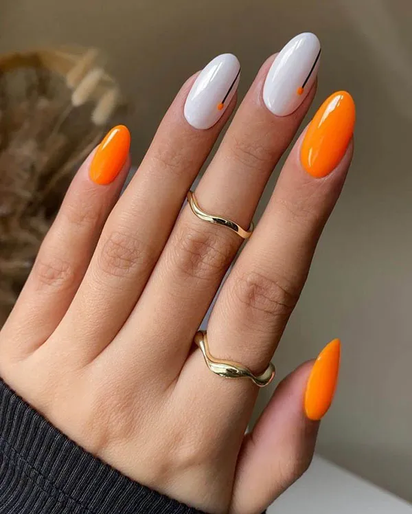 Orange and white nail design 27