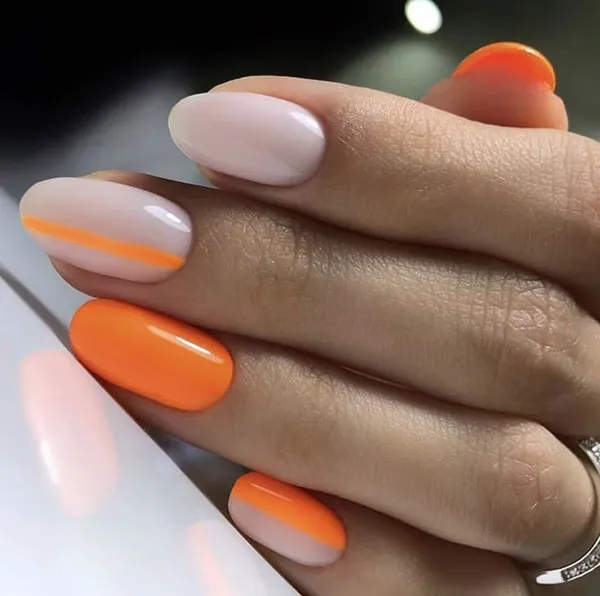 Orange and white nail design 28