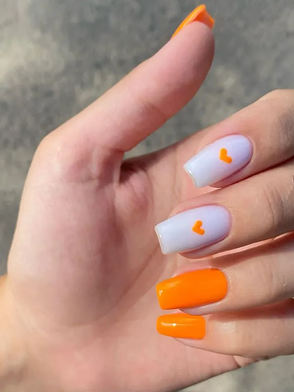Orange and white nail design 5