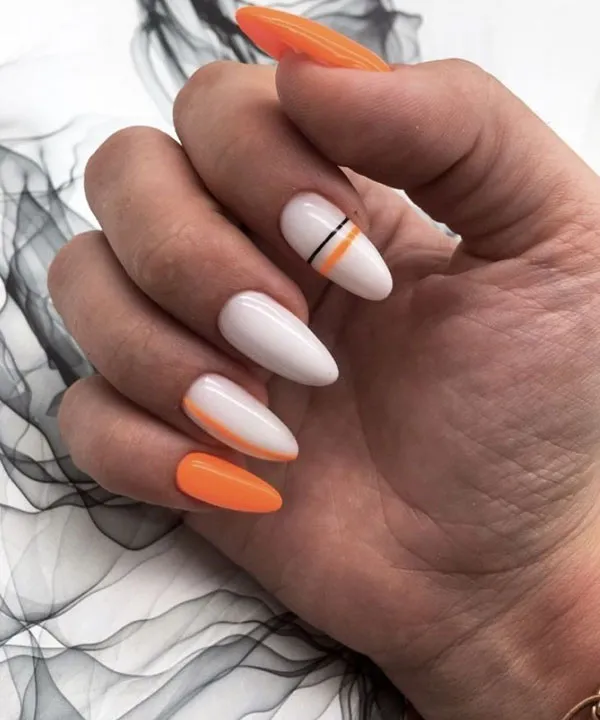 Orange and white nail design 7