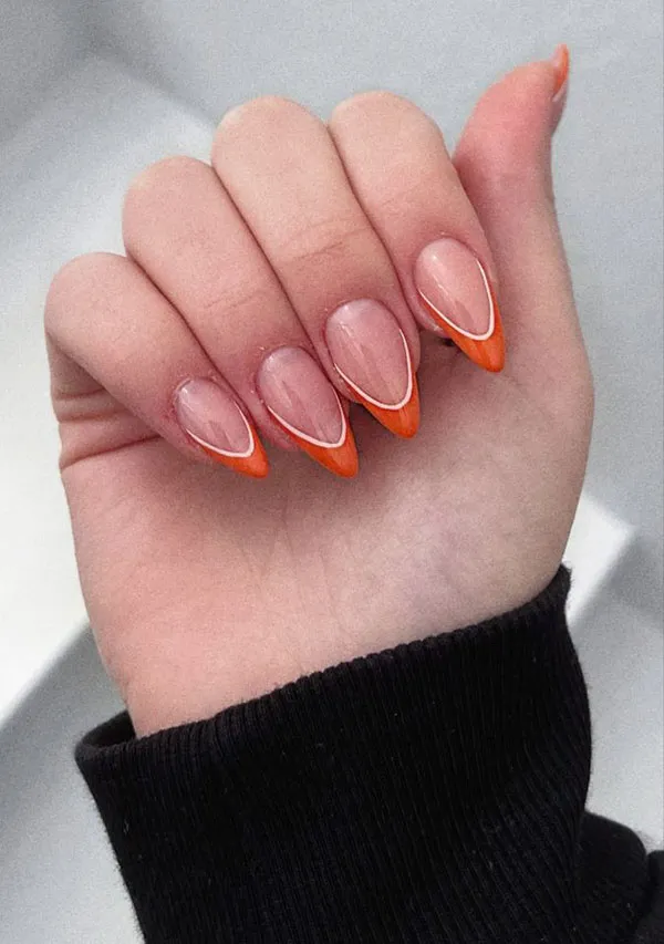 Orange and white nail design 8