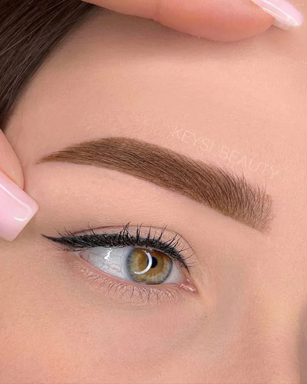 This years fashionable wide eyebrow model for girls 10