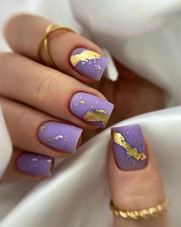 طراحی و دیزاین ناخن بنفش 2025؛ دیزاینایی که امسال ترند شدن و استایلتو خاصتر میکنن💜 26 purple nails trend diakoland photo 24