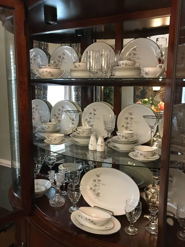 Arrangement of bridal china in the cabinet 11