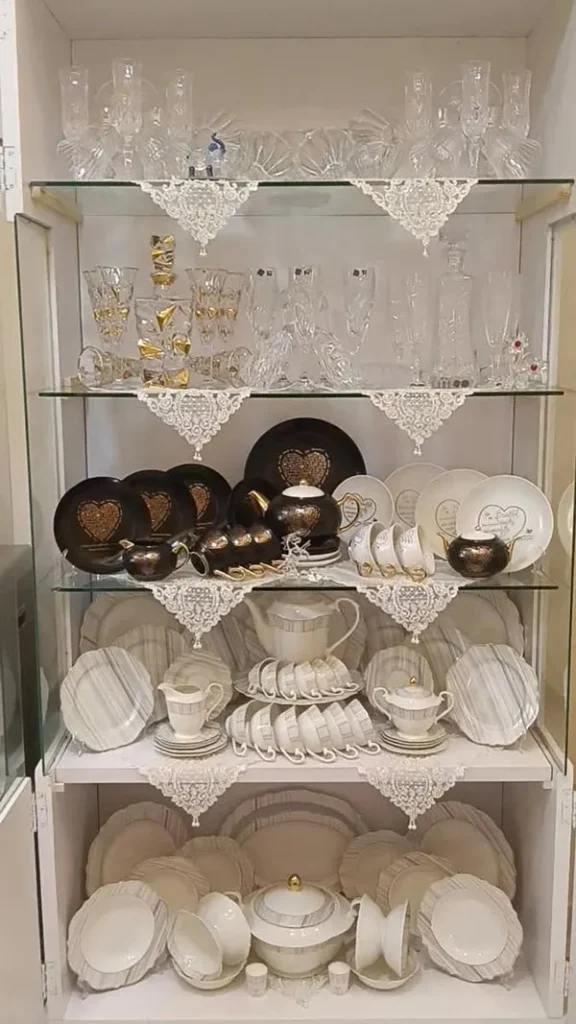 Arrangement of bridal china in the cabinet 24