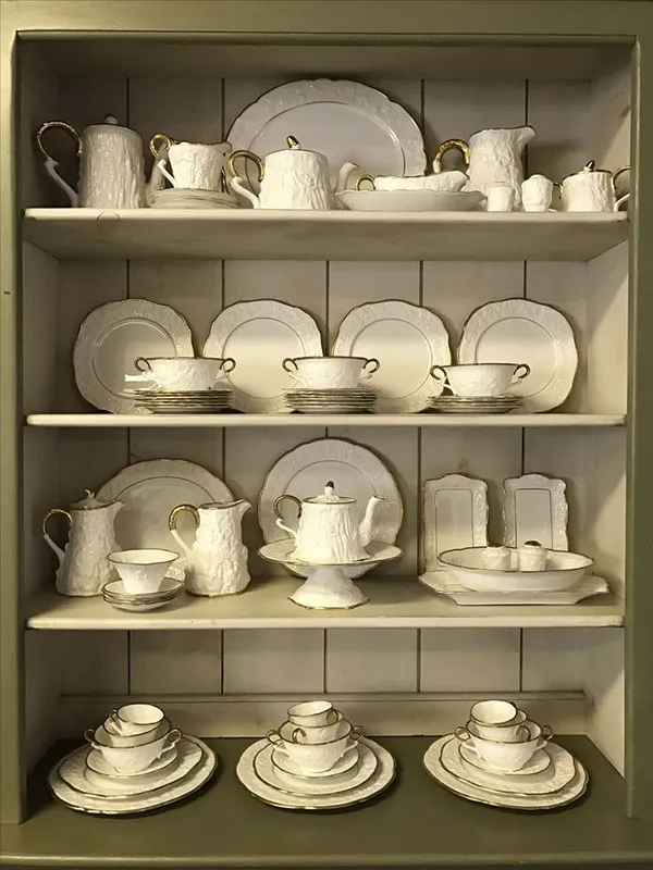 Arrangement of bridal china in the cabinet 27