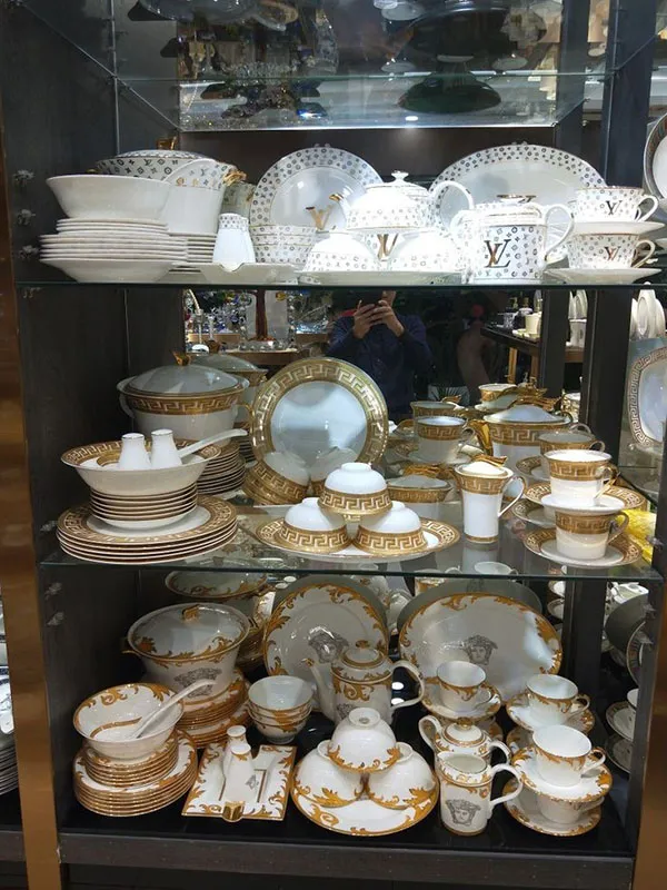 Arrangement of bridal china in the cabinet 29