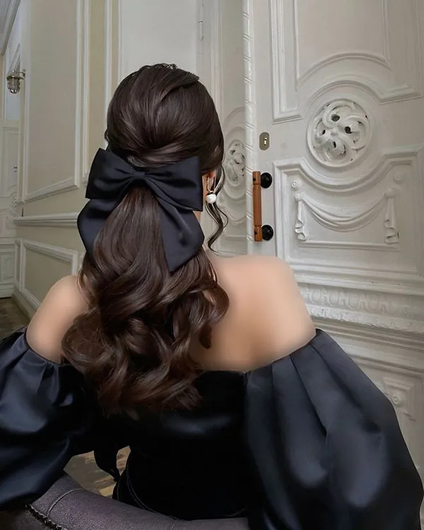 جدیدترین مدل شینیون مو مشکی باز 1404؛ انتخاب دخترونه برای مهمونیها! 15 Open black hair bun 11