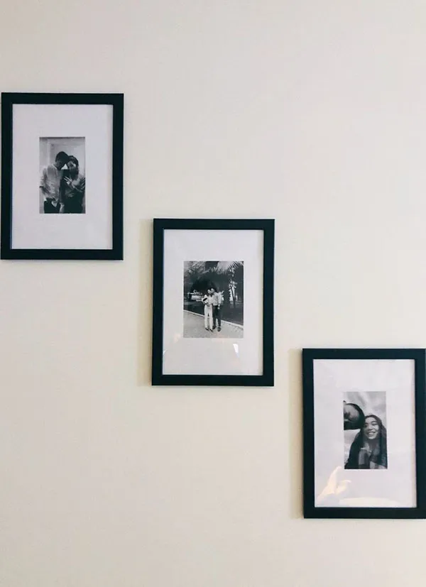 Photo frame arrangement in the reception area 26