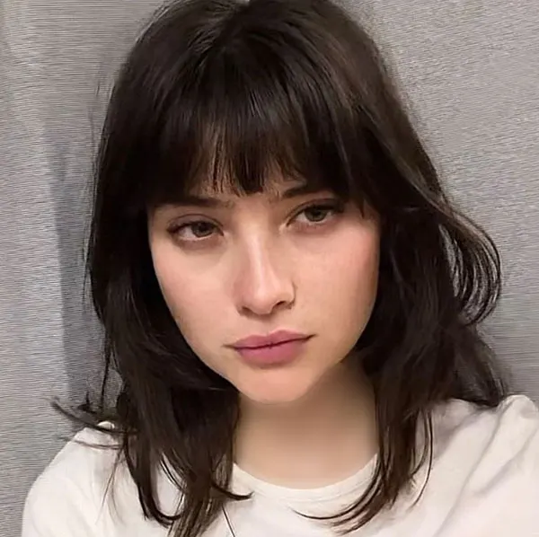 Hairstyle with bangs under the veil for school 31