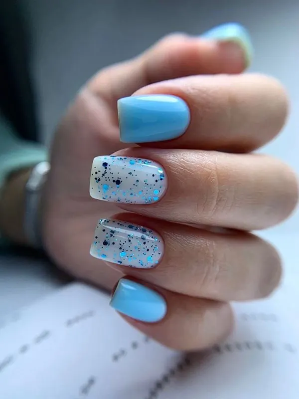 Pale blue nail design 18