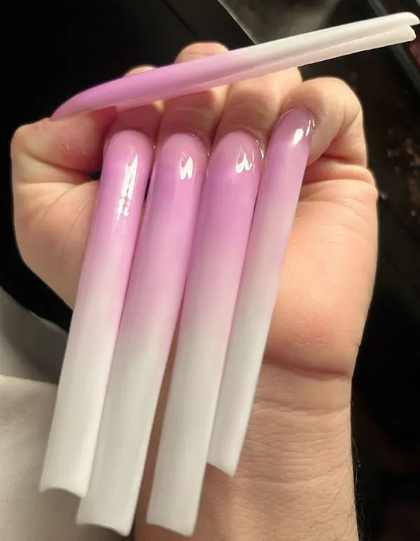 34 عکس از بلندترین ناخن ها؛ یا عاشقشی یا اصلاً نه!😎 16 The longest nail 12