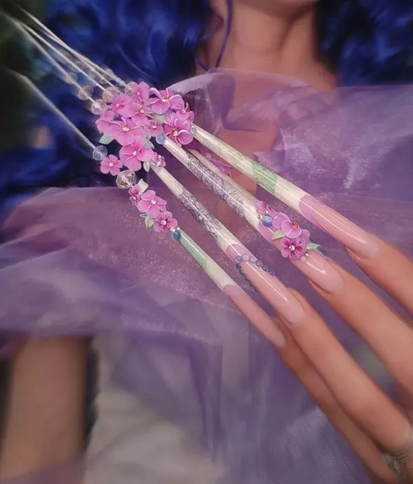 34 عکس از بلندترین ناخن ها؛ یا عاشقشی یا اصلاً نه!😎 19 The longest nail 16