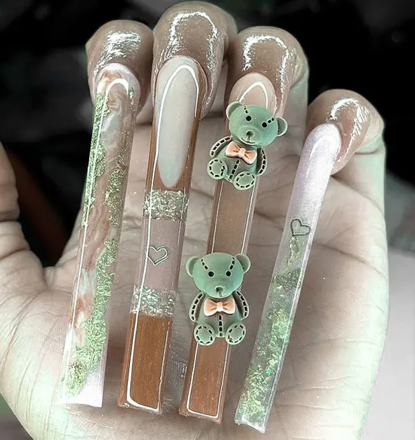 34 عکس از بلندترین ناخن ها؛ یا عاشقشی یا اصلاً نه!😎 25 The longest nail 23