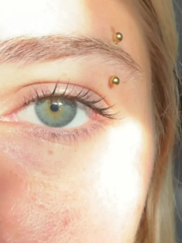 30 مدل پرسینگ ابرو خفن؛ تغییر کوچیکی که صورت رو خاصتر میکنه! 16 Eyebrow piercing 13