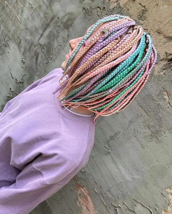 Braiding short hair with added colored hair extensions 17
