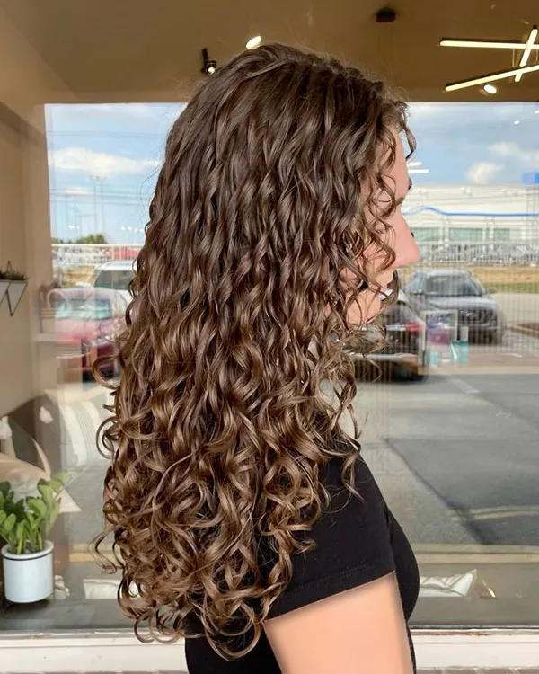 Long tight curly hairstyle 7