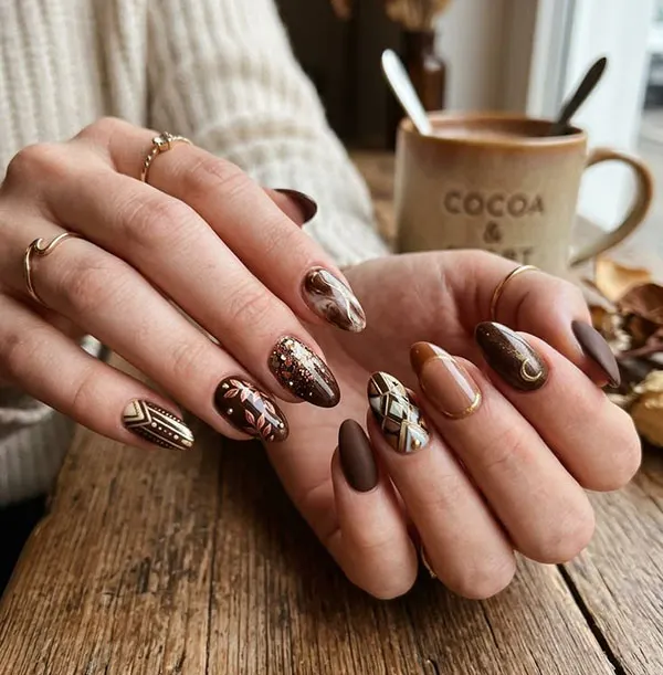 Chocolate themed nail design 10