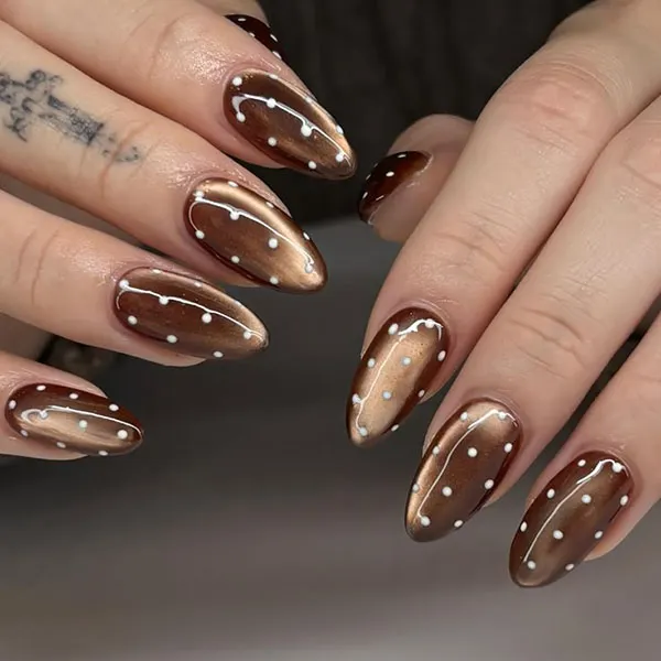 Chocolate themed nail design 11
