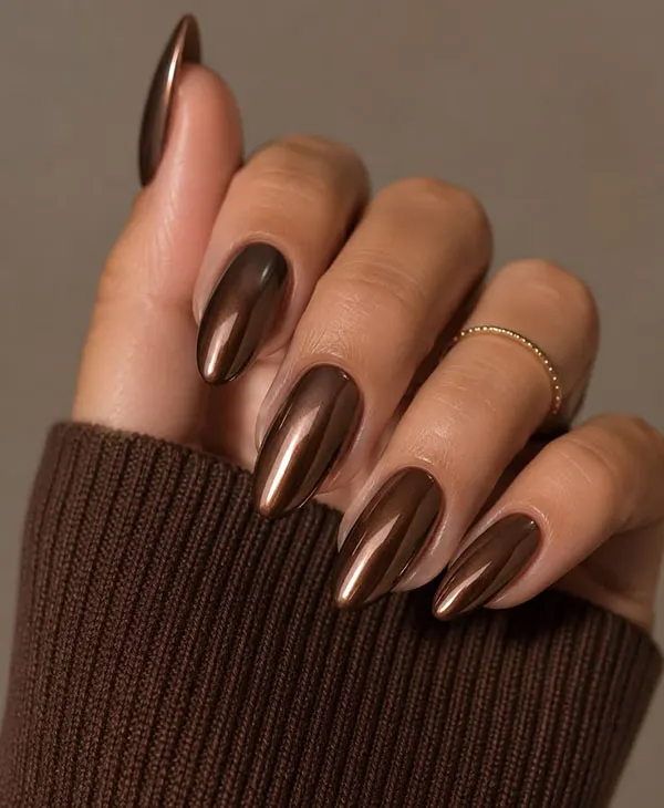 Chocolate themed nail design 12