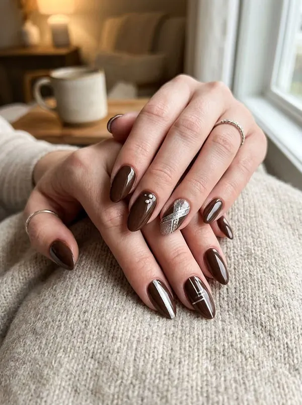 Chocolate themed nail design 13