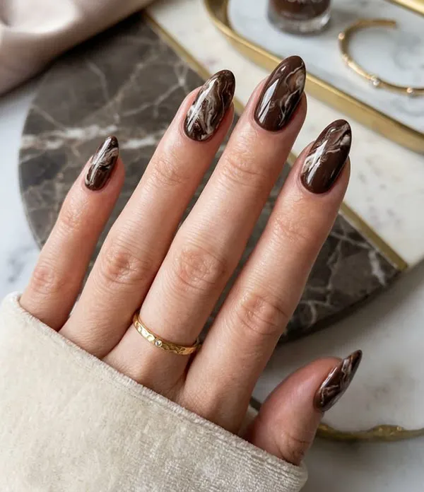 Chocolate themed nail design 17