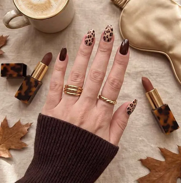 Chocolate themed nail design 19