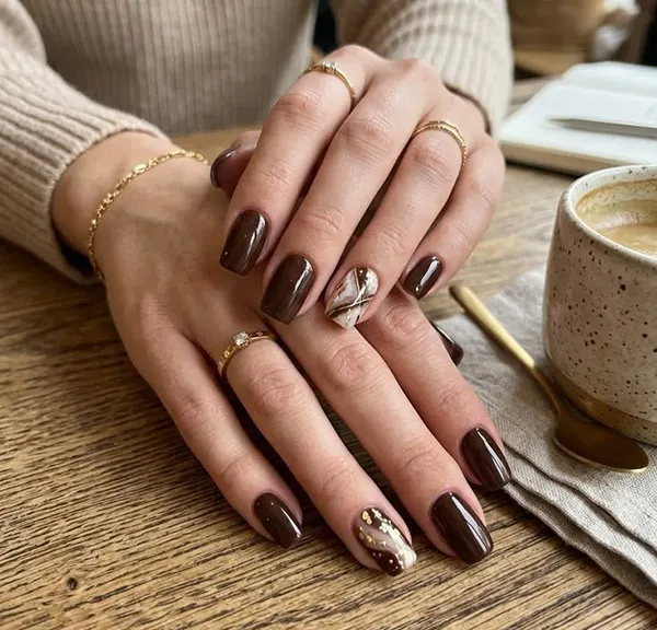 Chocolate themed nail design 21