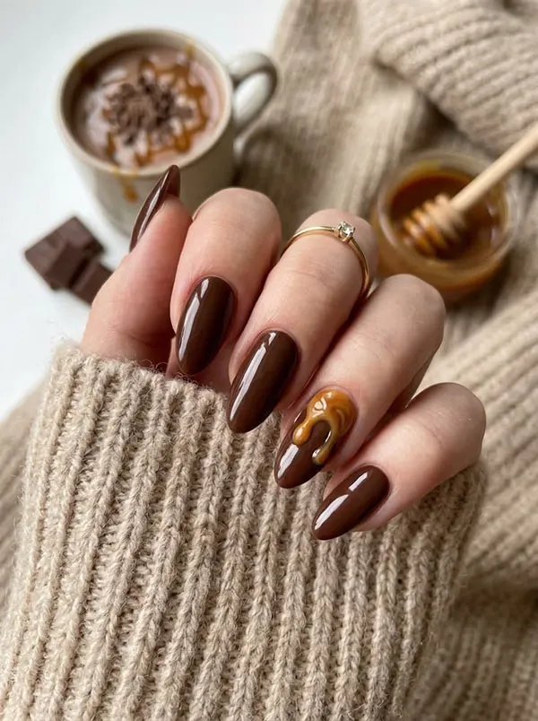 Chocolate themed nail design 25
