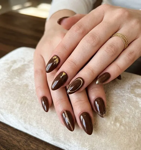 Chocolate themed nail design 28