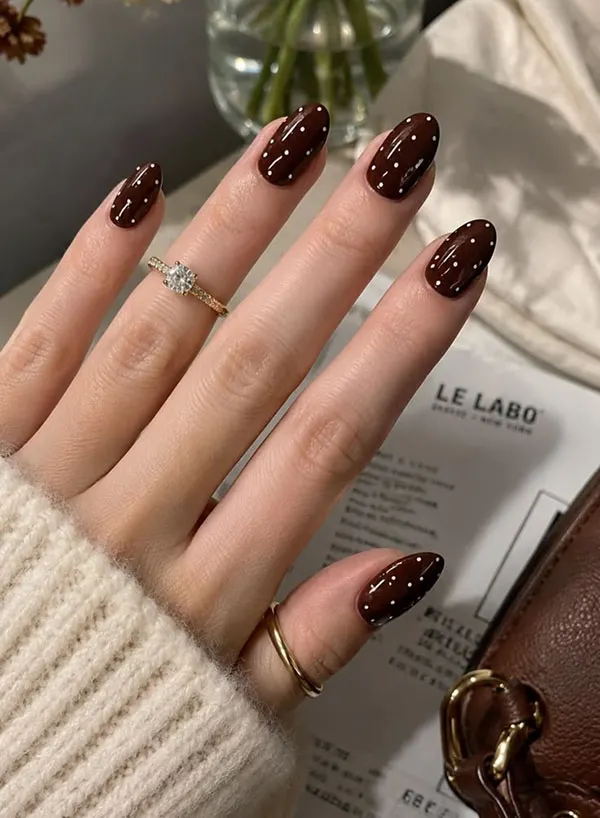 Chocolate themed nail design 30