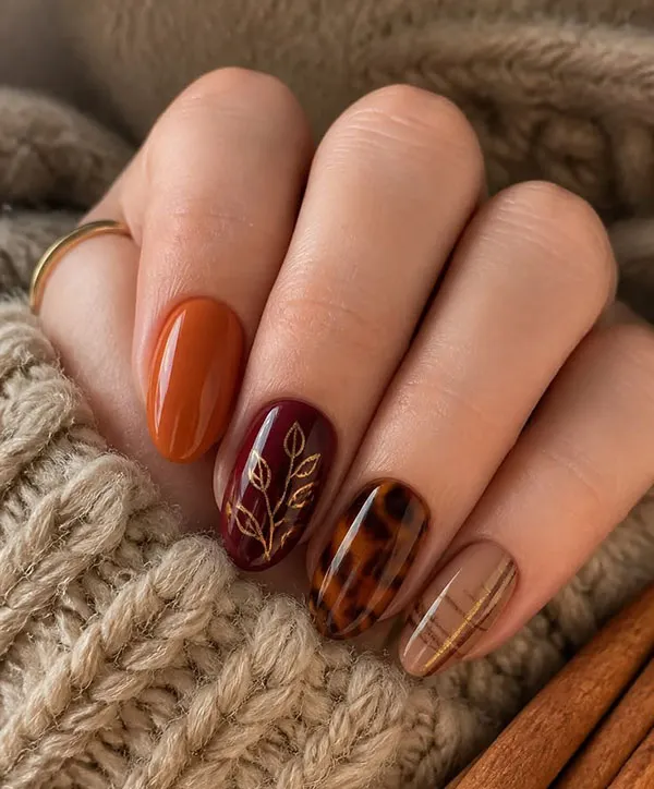 طرح ناخن پاییز امسال 2026؛ از قهوهای دلنشین تا زرشکی جسورانه! 9 This autumns nail designs 31